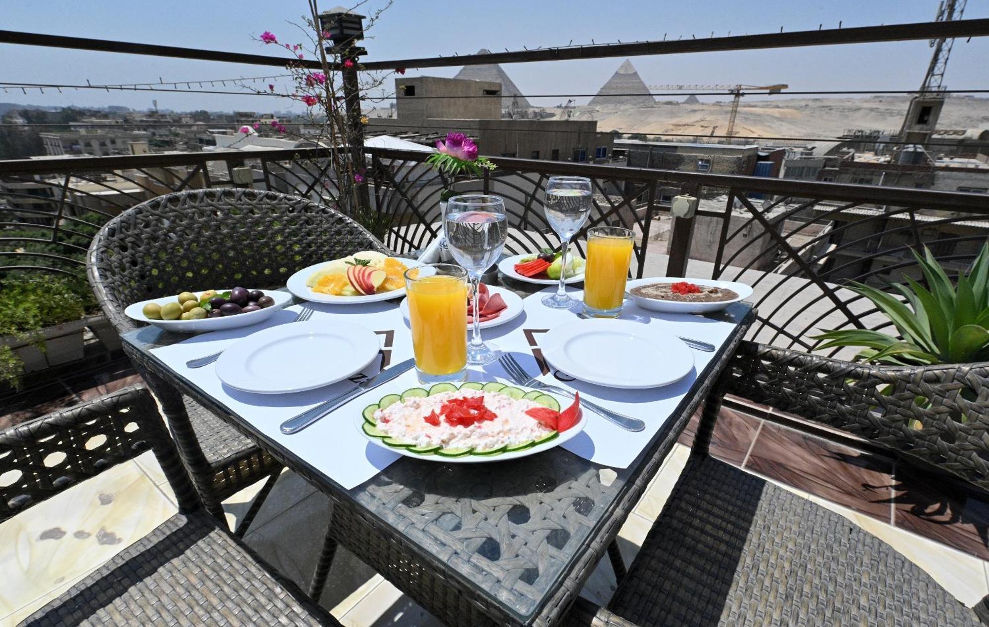 Hotel Pyramids Gem Plaza Kafret el-Gabal Esterno foto
